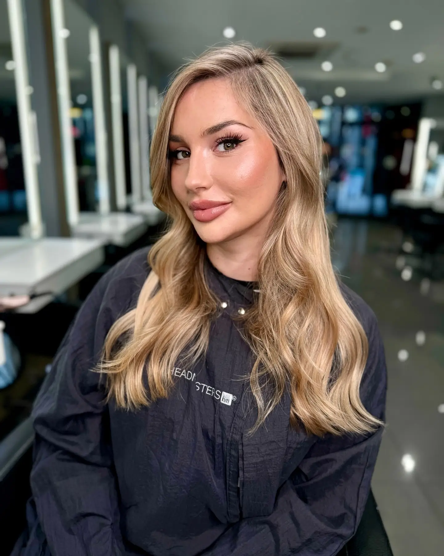 champagne summer blonde hair color 2026 Soft Champagne Layers With Face-Framing Glow