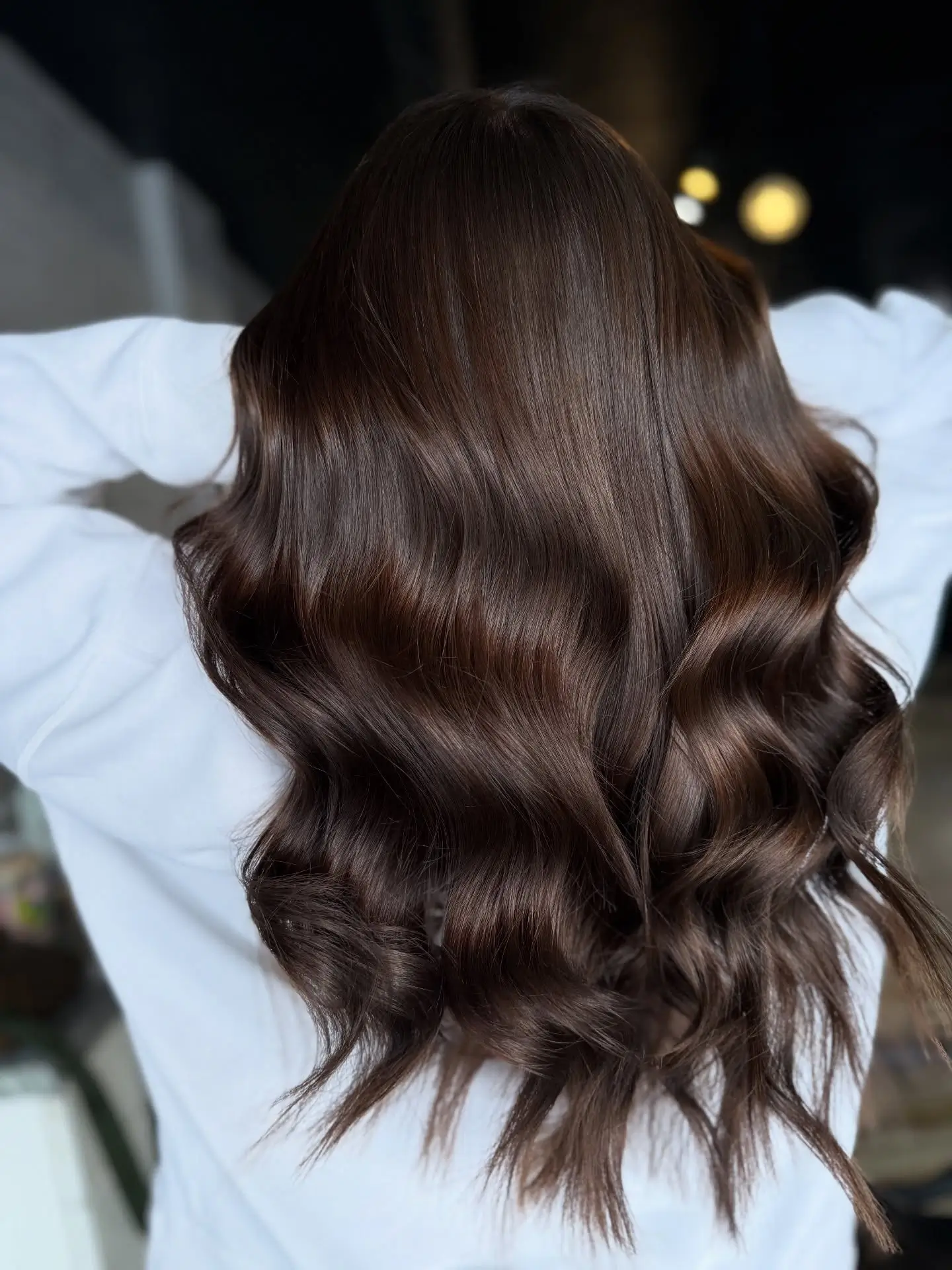 dark-rooted summer hair color for brunettes 2026 Glossy Deep Brunette Waves With Mirror Shine