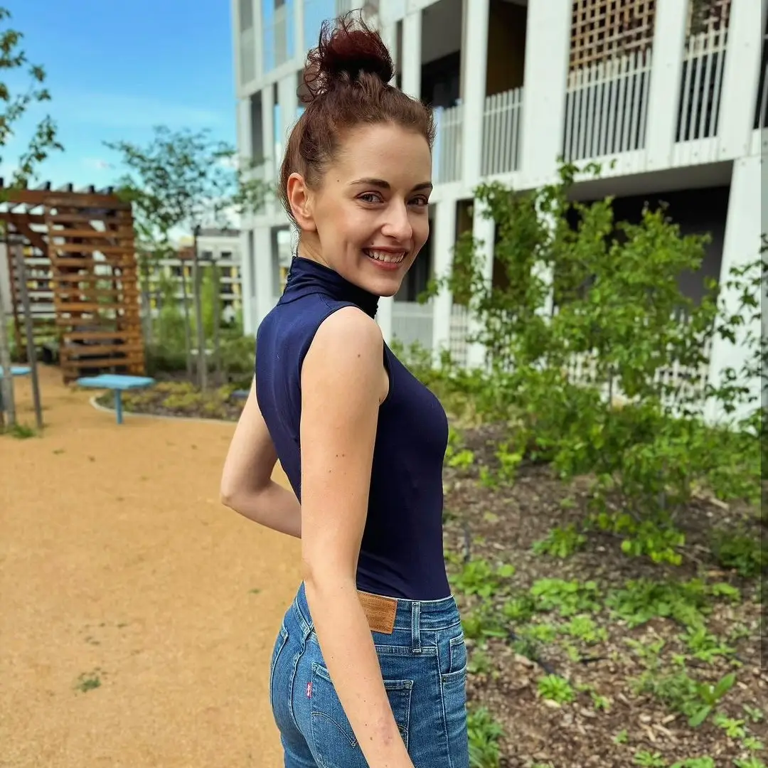 summer bodysuit outfits for women 2026 Sleek High Neck Navy Bodysuit With Classic Denim Balance