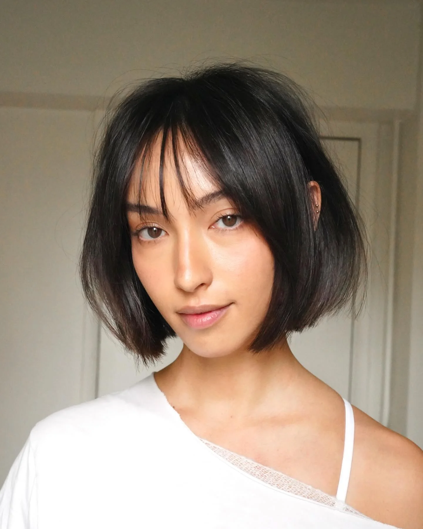 airy summer haircuts with bangs 2026 Soft French Bob With Micro Air Bangs