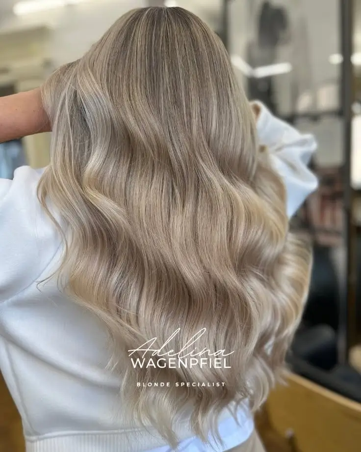 champagne summer blonde hair color 2026 Cool Beige Champagne Waves With Dimensional Finish