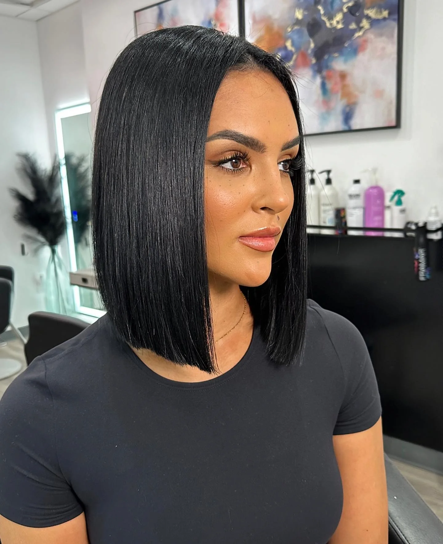 sleek summer collarbone cut 2026 Glossy Black Glass Hair With Ultra Sharp Edges