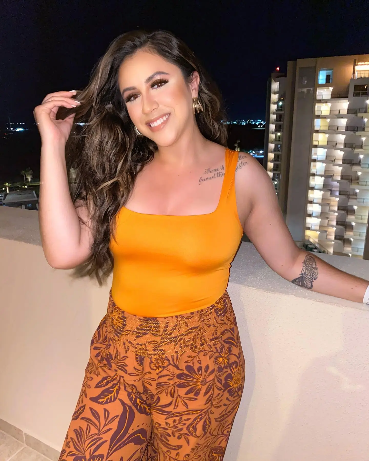 summer bodysuit outfits for women 2026 Bold Orange Bodysuit With Statement Printed Pants For Night Looks