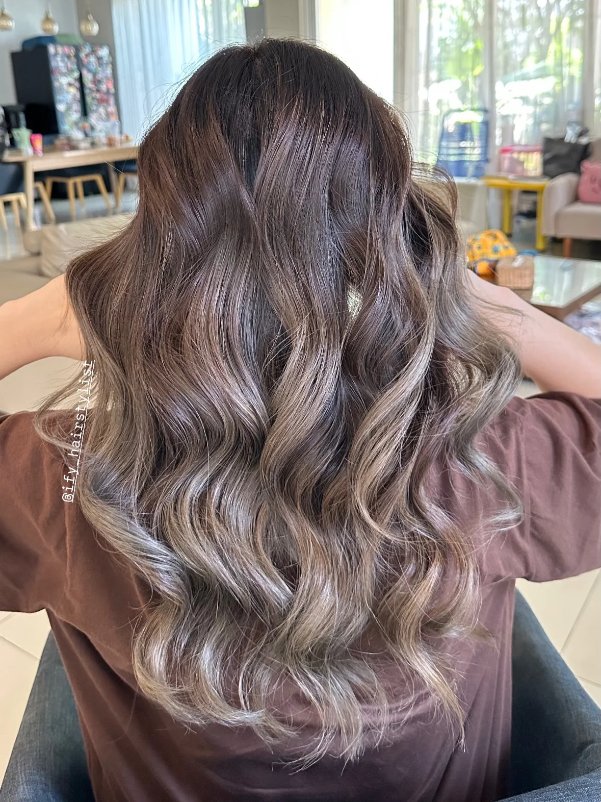 modern summer ash brown hair color 2026 Soft Milk Tea Balayage With Airy Brunette Layers