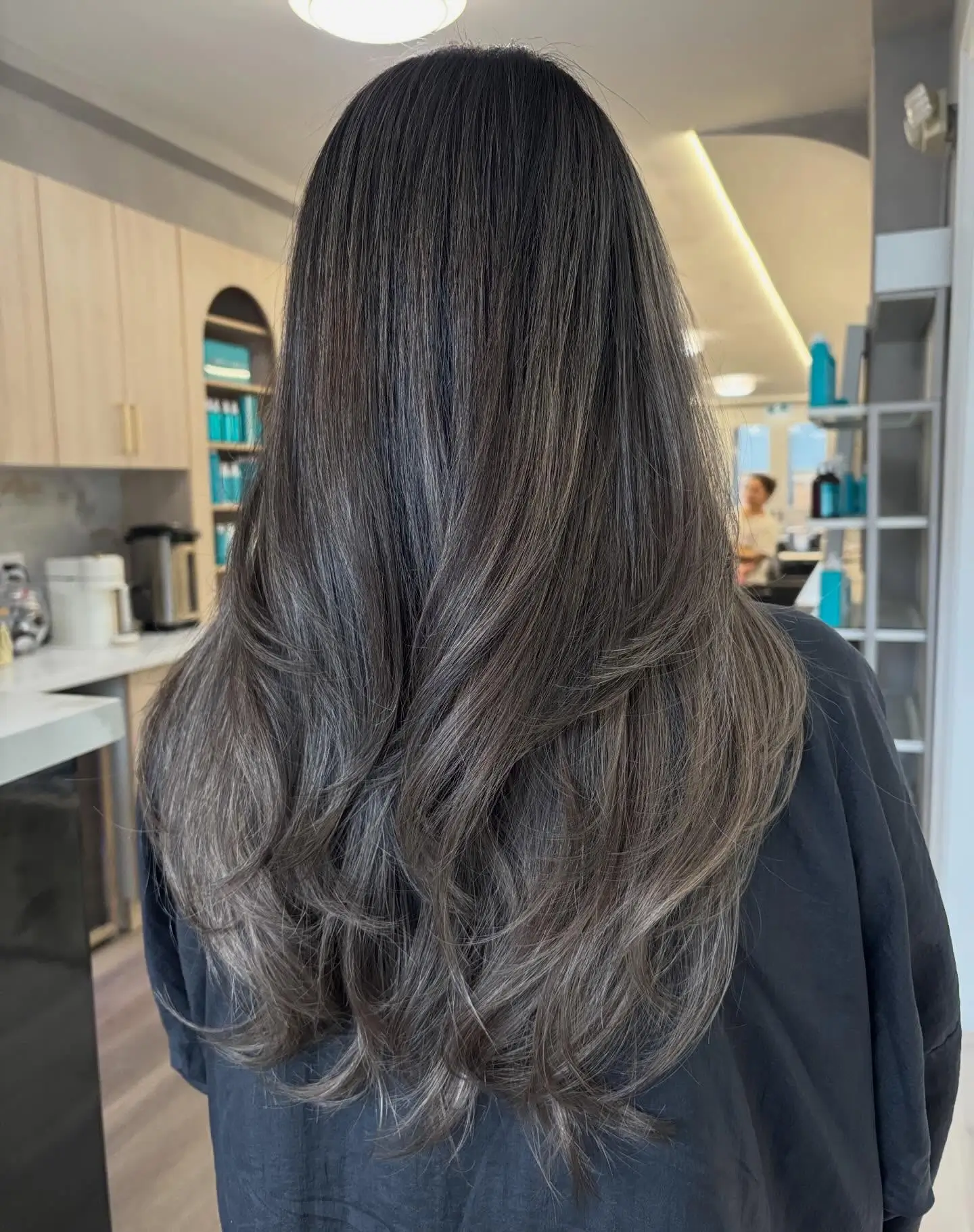 smoky summer mushroom brown hair color 2026 Layered Smoky Brunette With Glossy Dimensional Finish