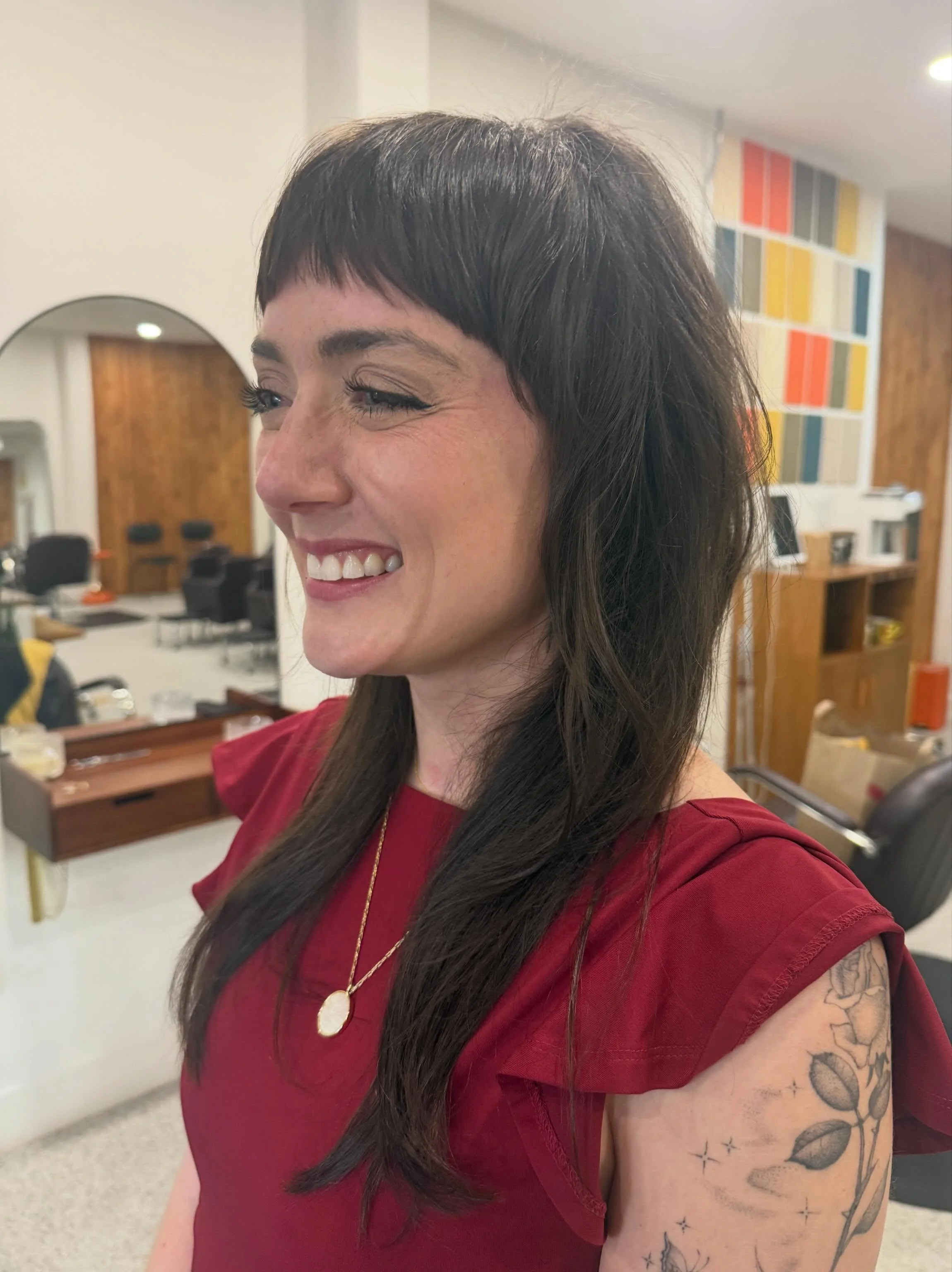 airy summer haircuts with bangs 2026 Modern Layered Cut With Short Textured Bangs