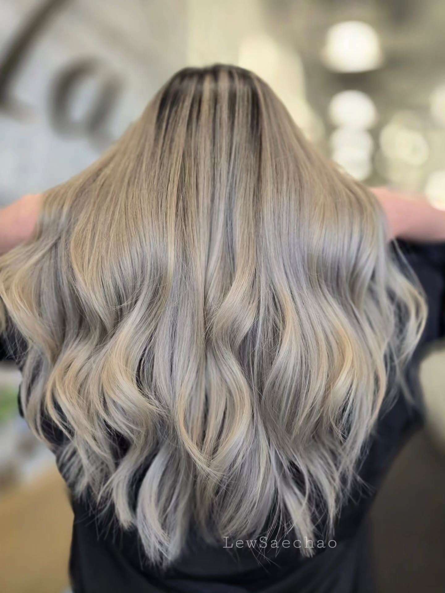 bright summer ash blonde hair color 2026 Airy Ash Blonde Waves With Light Golden Dimension