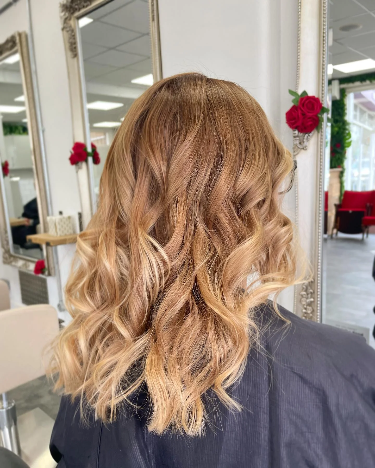 beachy summer hair color for tan skin 2026 Golden Honey Melt On Soft Layered Waves