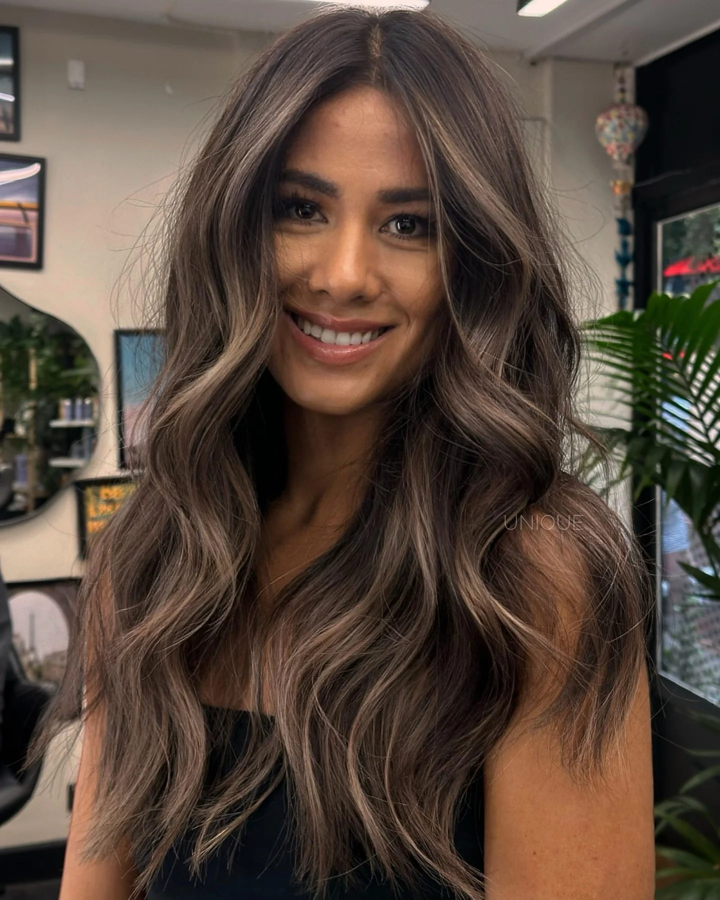 modern summer ash brown hair color 2026 Glossy Cool Ash Brown Waves With Natural Lift