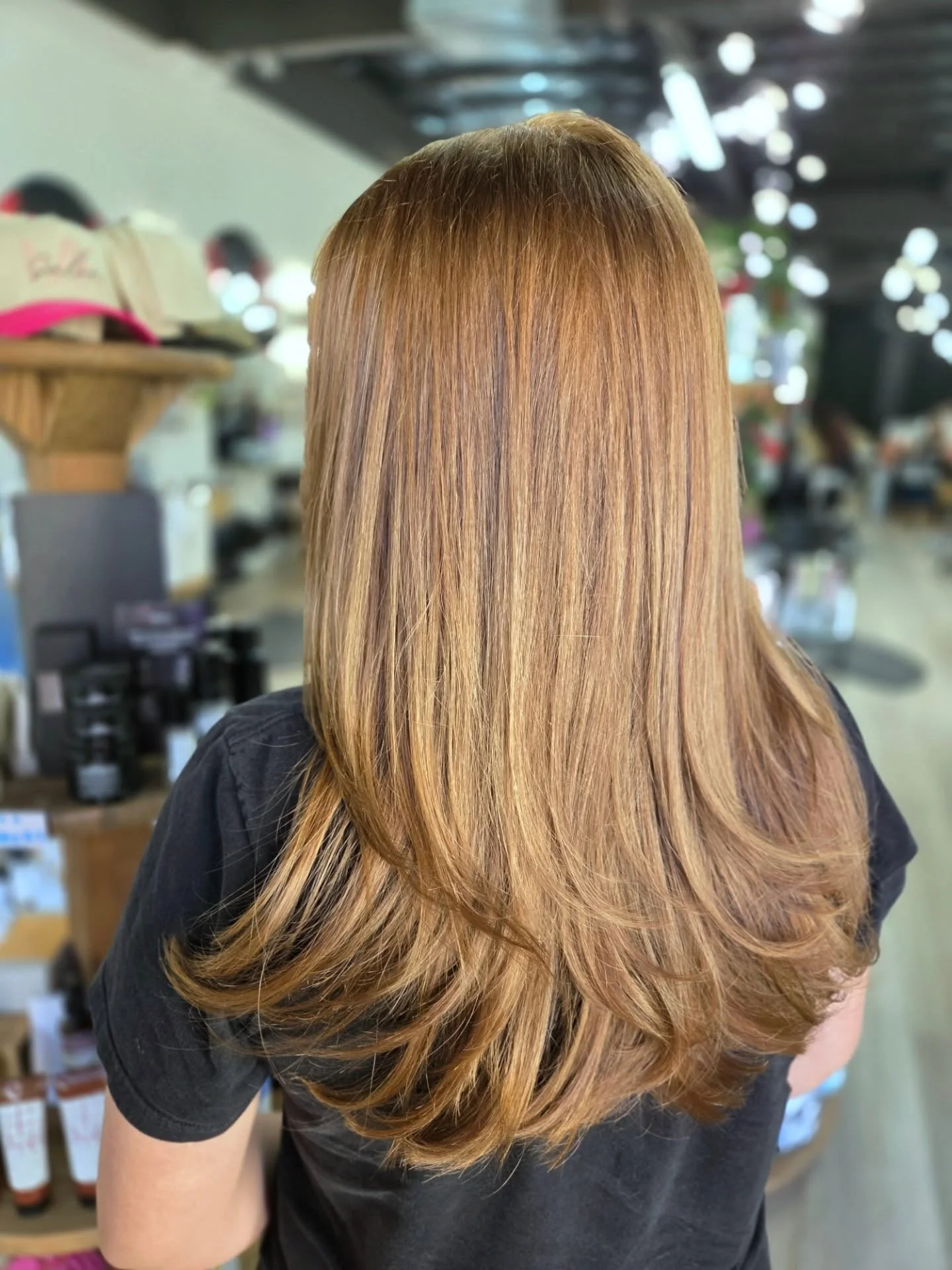 salon summer honey brown hair color 2026 Glossy Layered Honey Brown With Soft Feathered Ends