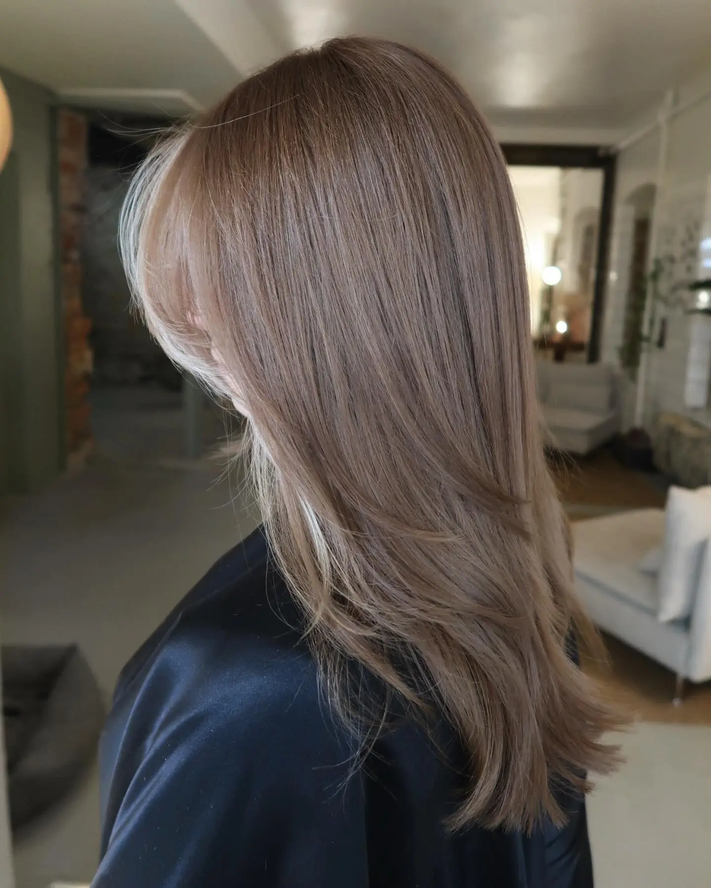 smoky summer mushroom brown hair color 2026 Feathered Mushroom Brown Layers With Soft Blonde Veil