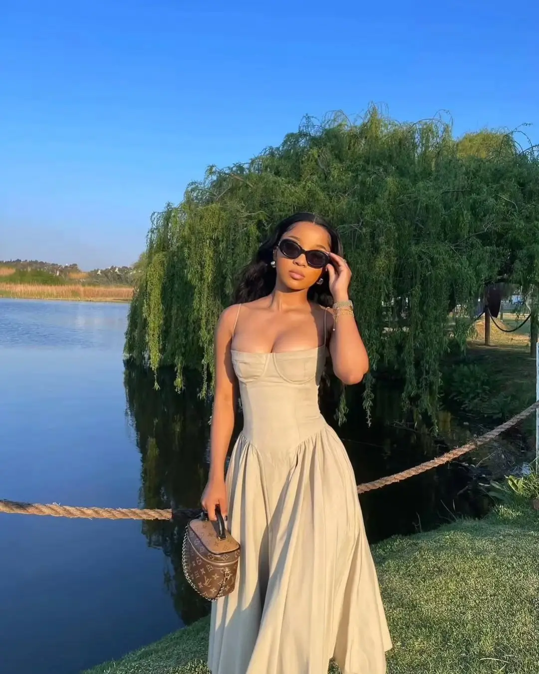 trendy summer outfits for black woman 2026 Soft Neutral Midi Dress That Redefines Effortless Elegance