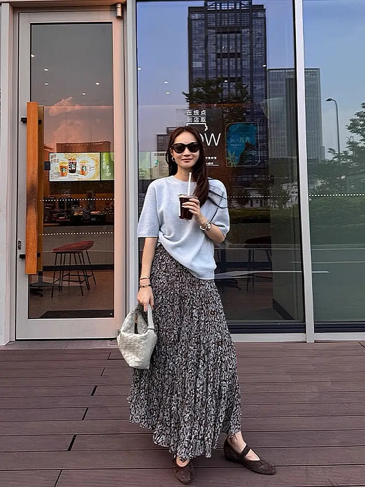 casual summer t-shirt outfit for women 2026 Soft Blue Tee And Flowing Printed Skirt For Smart Casual Days