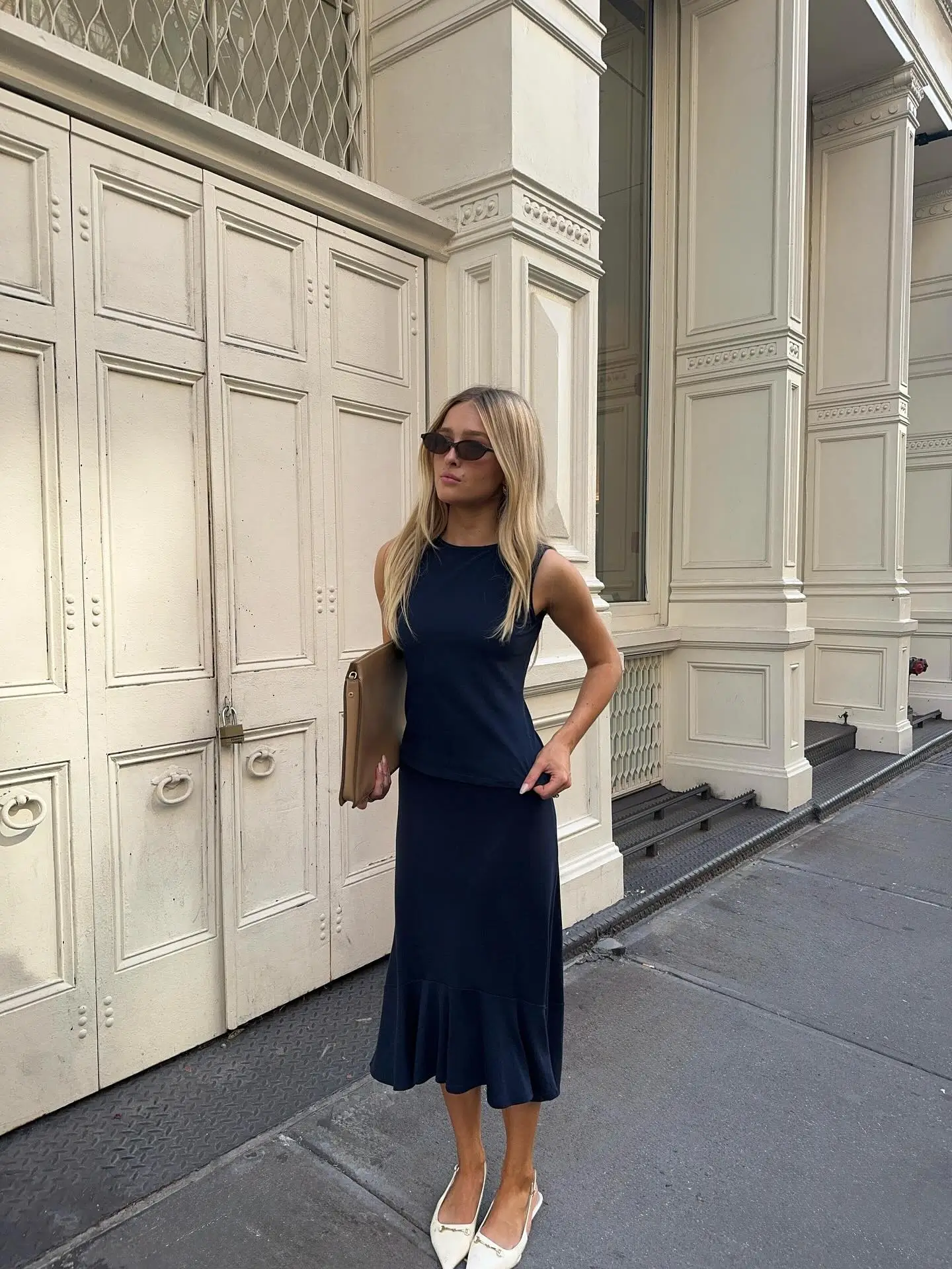 summer business casual outfit for women 2026 Understated Elegance With A Sleeveless Navy Dress