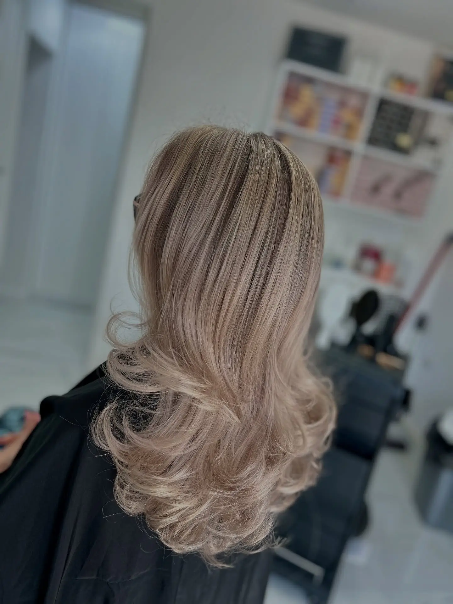 summer blonde hair color 2026 Layered Champagne Blonde With Soft Volume And Movement