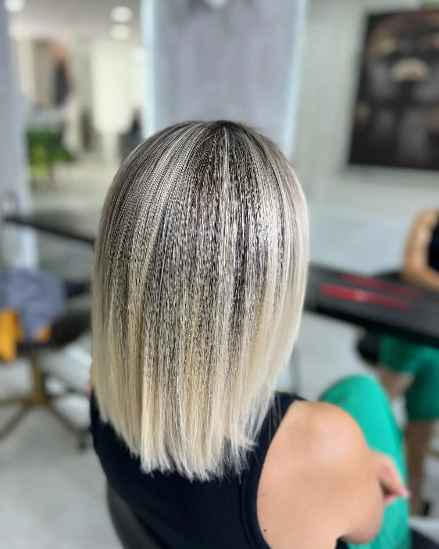 low maintenance summer ombre hair color 2026 Cool Toned Root Melt With Sleek Blonde Finish