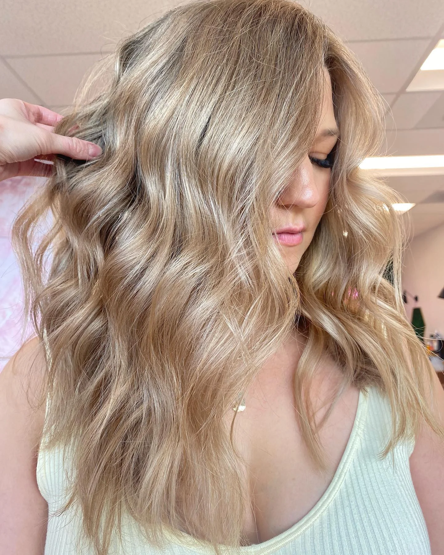 champagne summer hair color for light skin 2026 Voluminous Champagne Layers With Soft Rose Undertone