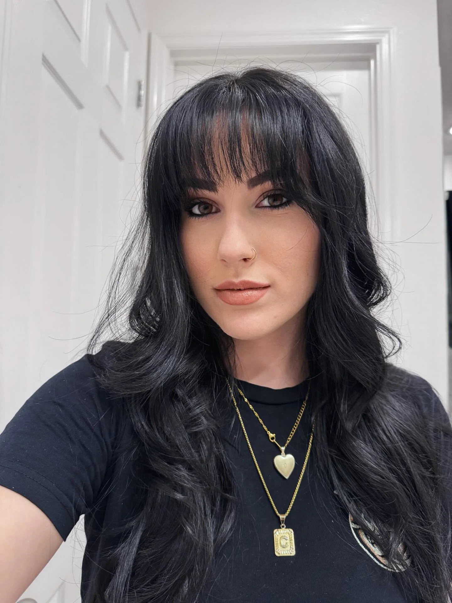 airy-summer-haircuts-with-bangs-2026 Voluminous Long Wavy Layers With Full Fringe