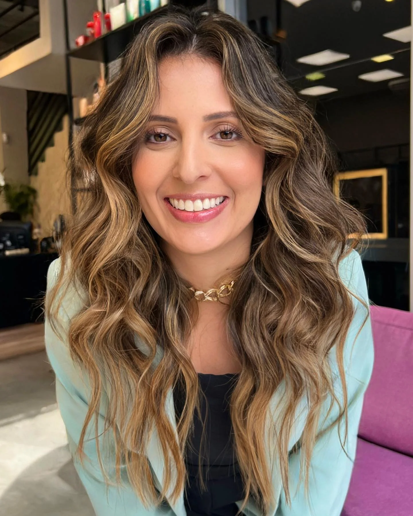 beachy summer hair color for tan skin 2026 Soft Layered Waves With Honey Face Framing Lightness