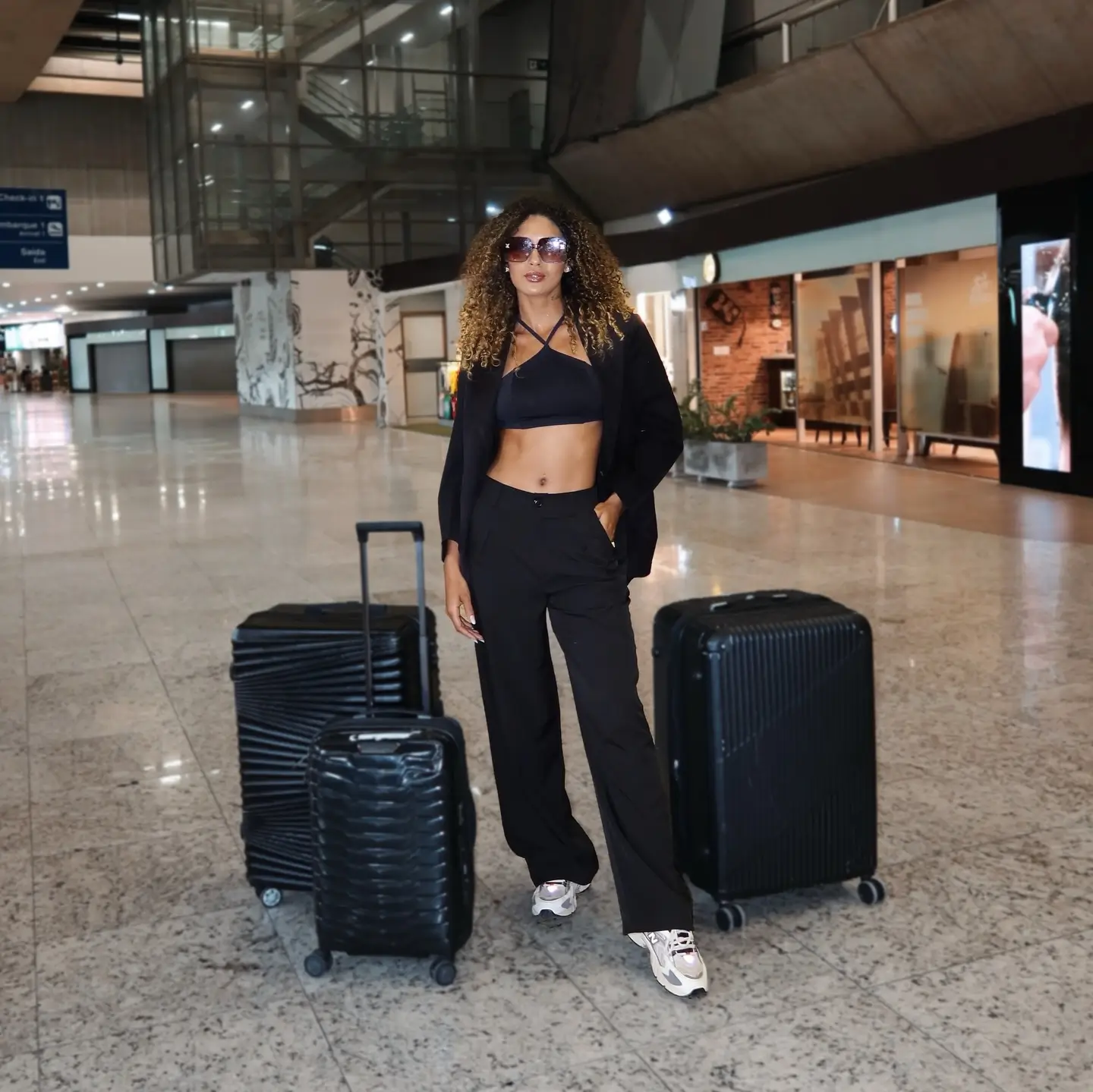 comfy airport outfits summer 2026 All Black Travel Chic With Elevated Basics