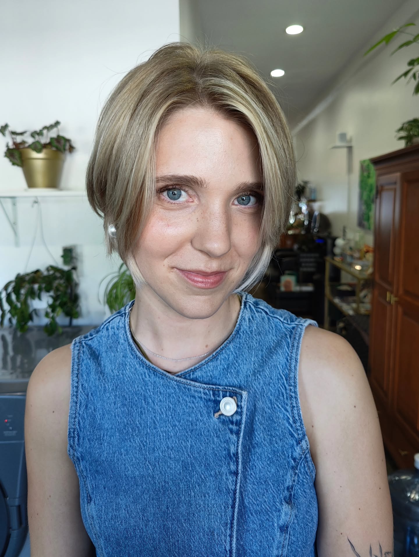 cropped summer bixie haircut 2026 Chic Center Part Bixie With Face Framing Layers