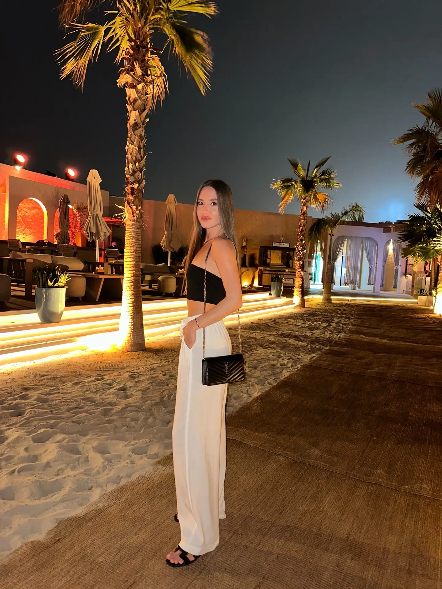 summer night going out outfits 2026 Black Crop Top With Wide-Leg Trousers For Beach Night Elegance