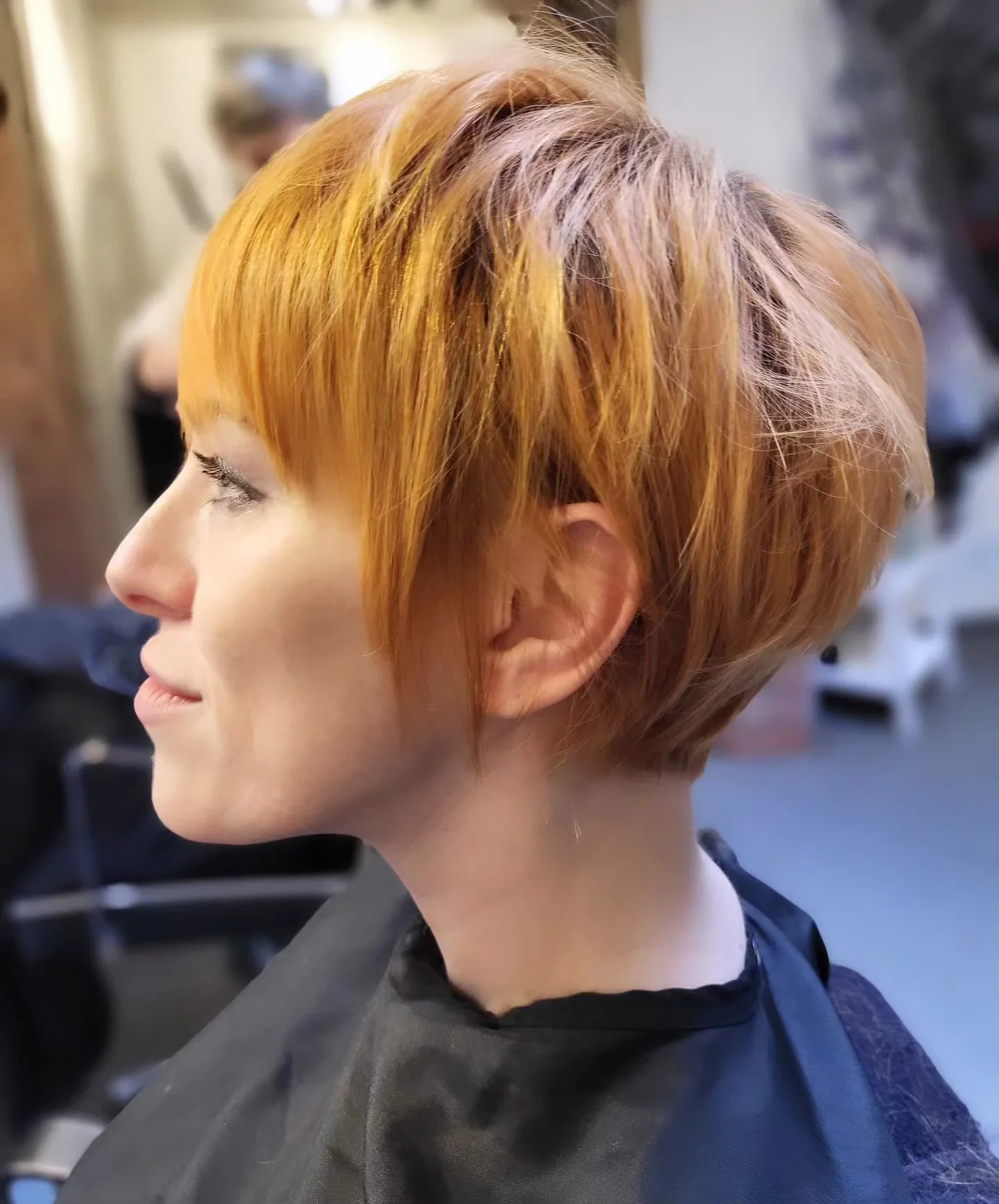 cropped summer bixie haircut 2026 Golden Layered Bixie With Soft Side Bangs And Volume