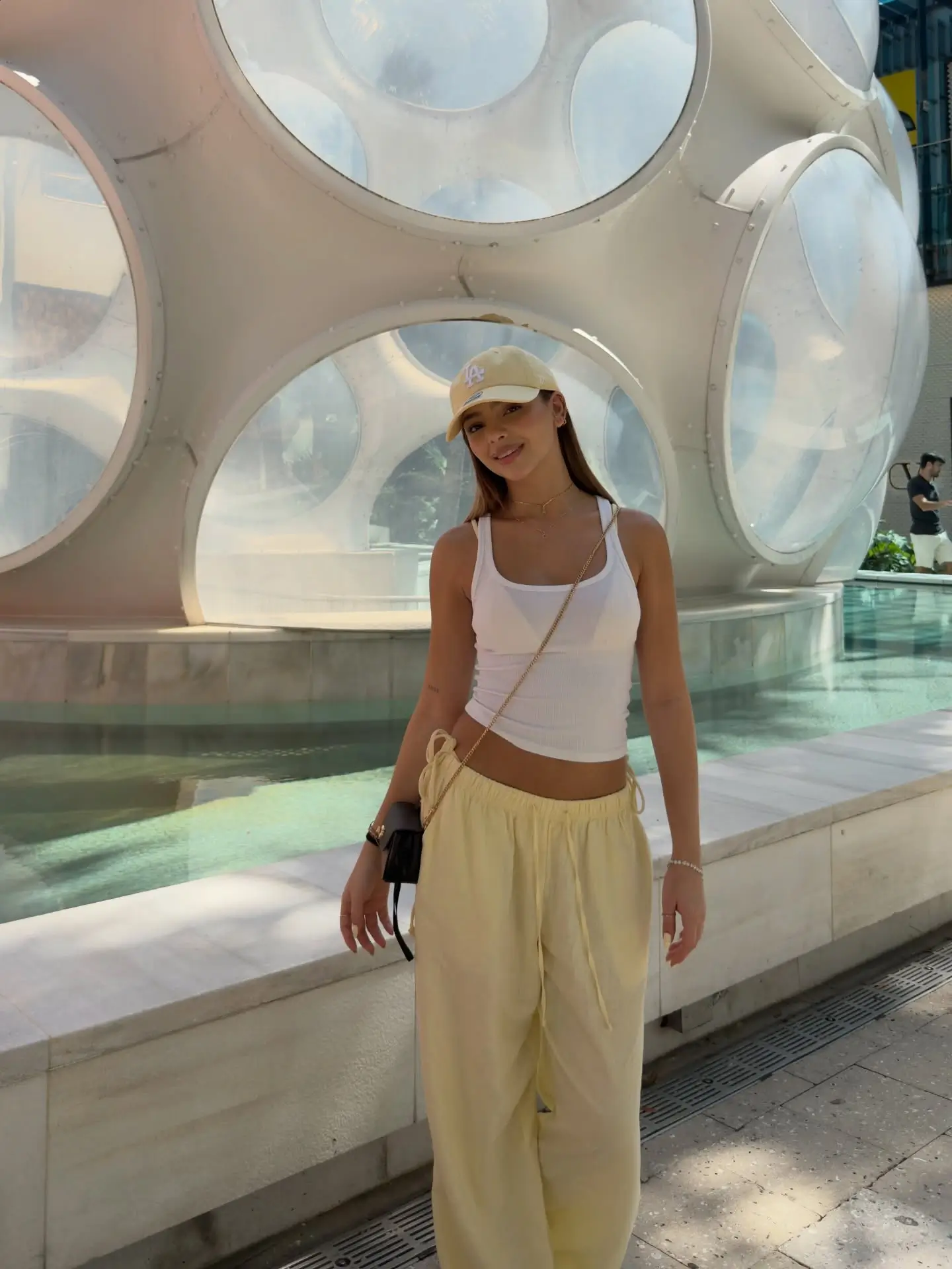 summer sleeveless tops for women 2026 White Tank And Soft Yellow Trousers That Feel Like Sunshine