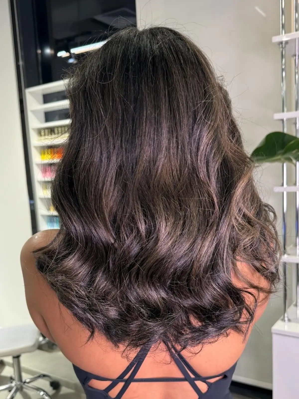 dark-rooted summer hair color for brunettes 2026 Cool Brunette Waves With Smoky Dimension