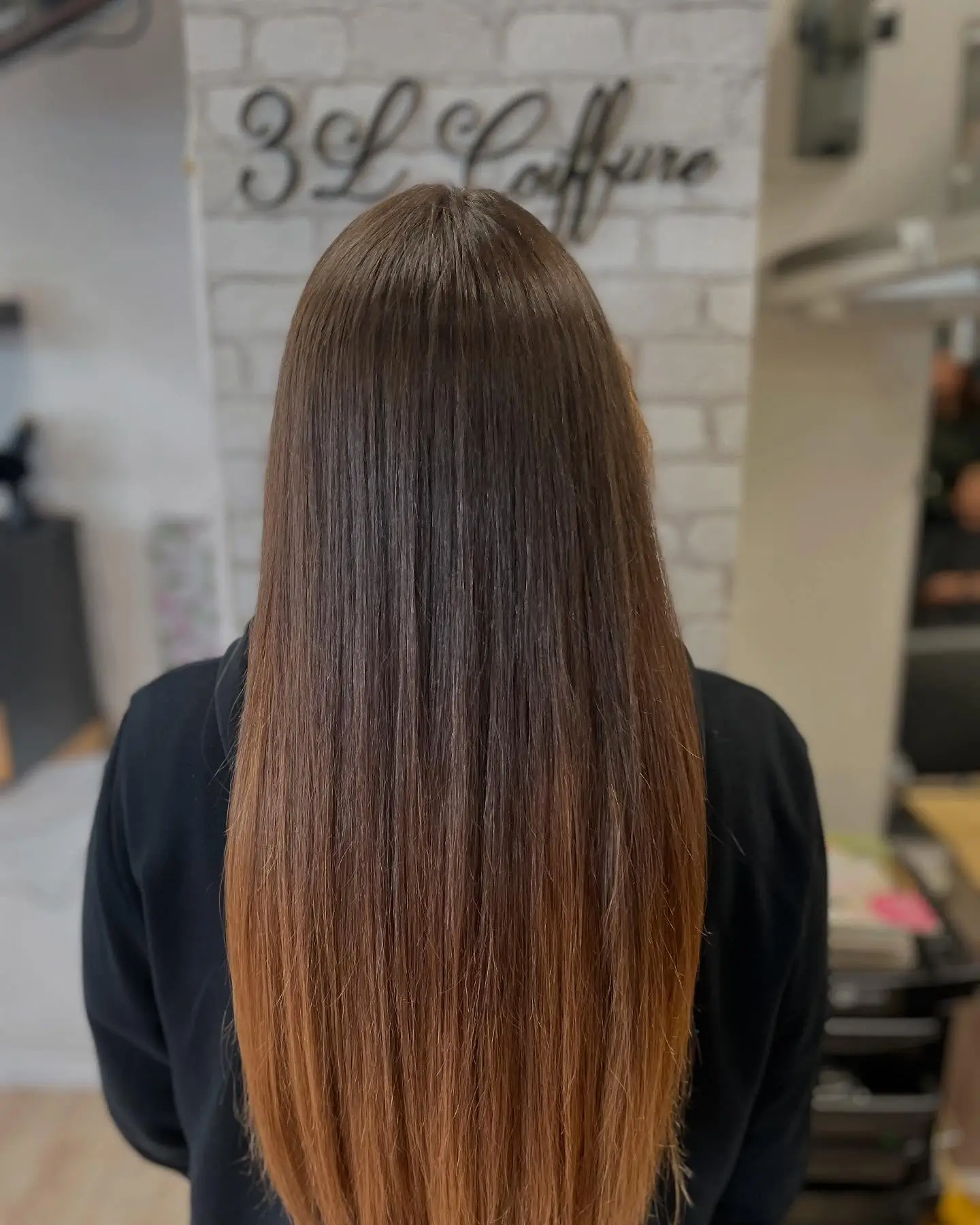 low maintenance summer ombre hair color 2026 Glossy Brunette Fade With Caramel Light Play