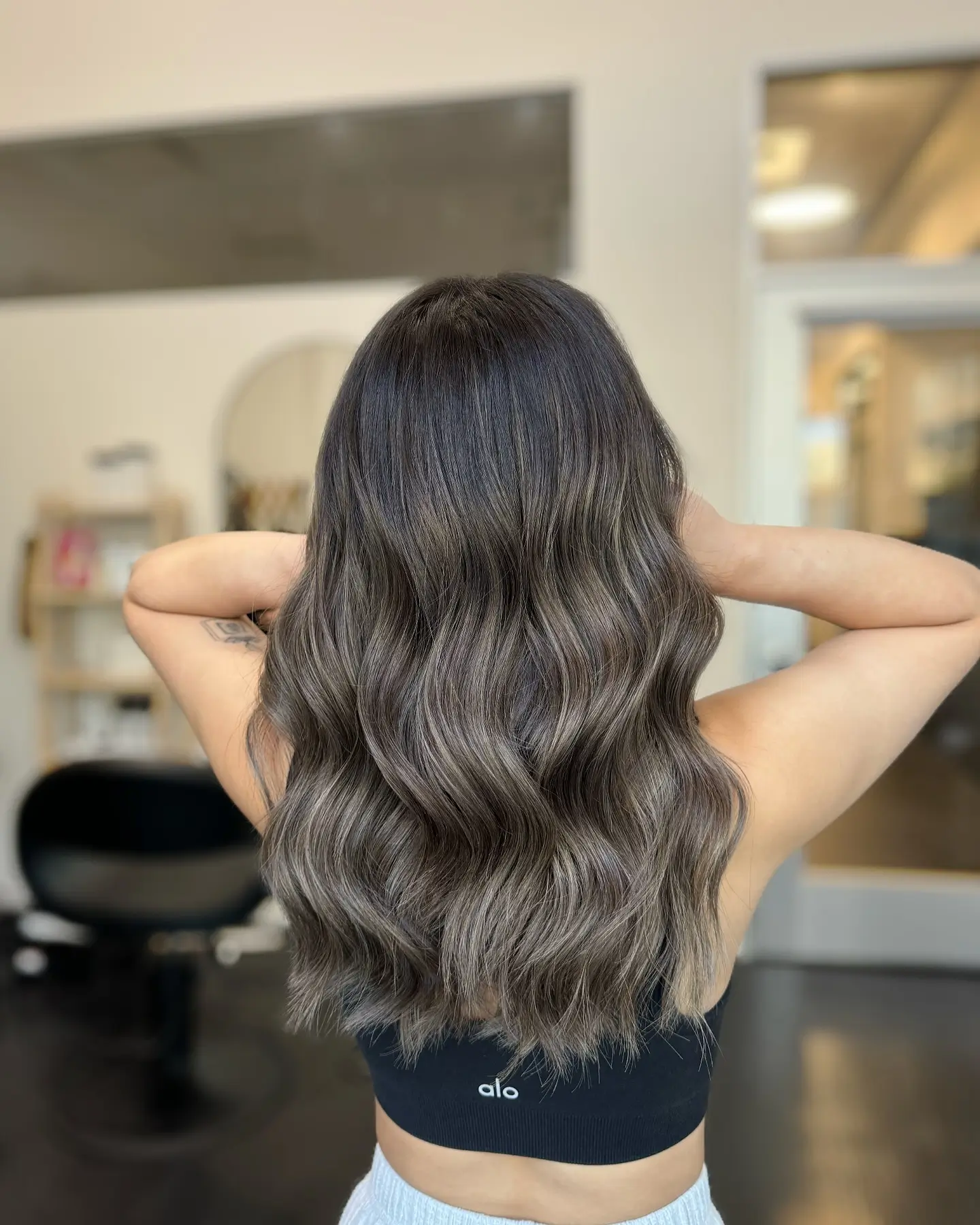 smoky summer mushroom brown hair color 2026 Dimensional Mid Length Waves With Balanced Balayage