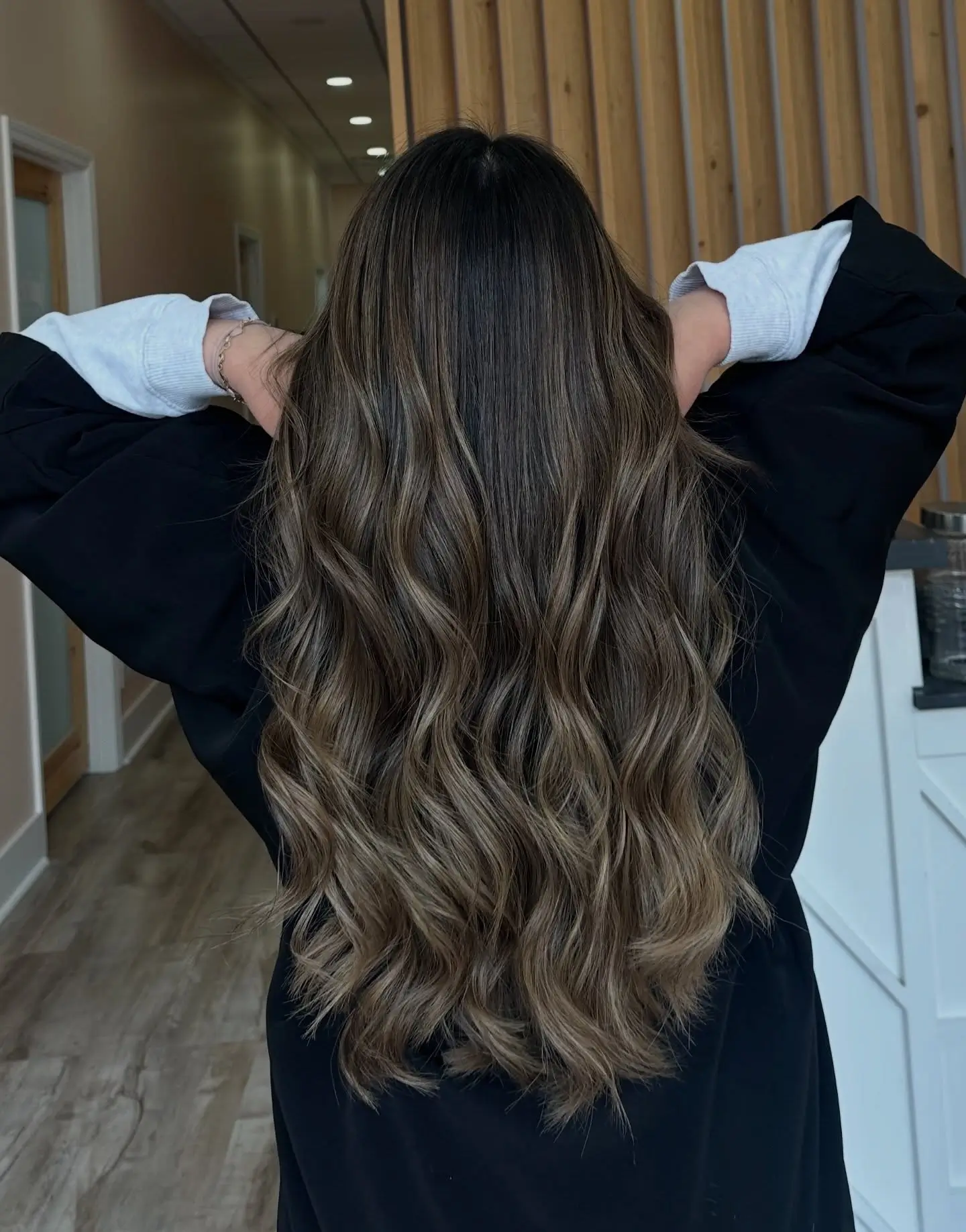 dark-rooted summer hair color for brunettes 2026 Muted Mocha Balayage With Seamless Depth