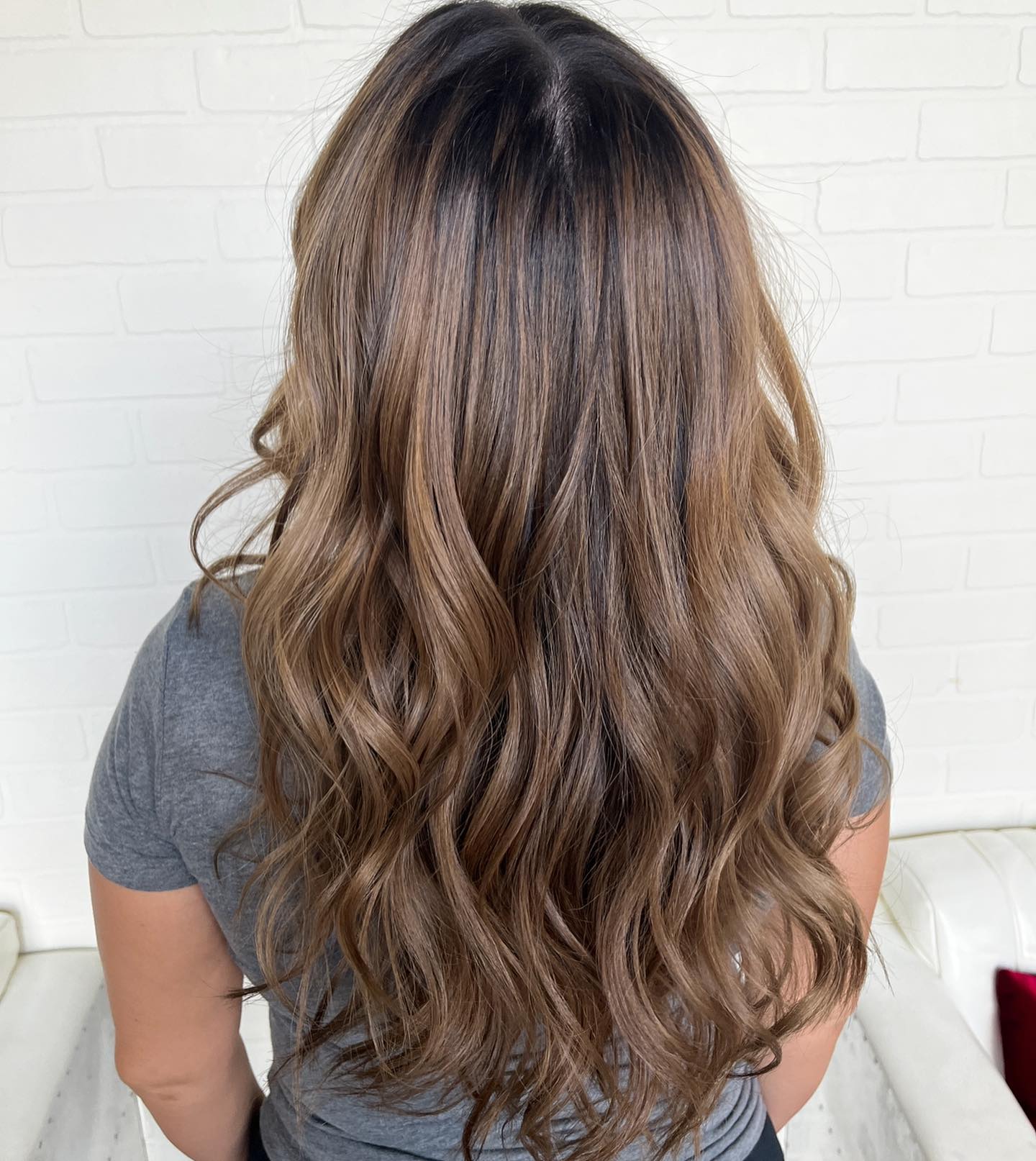 light summer hair color brunette Softly Blended Light Brown Balayage With Airy Texture