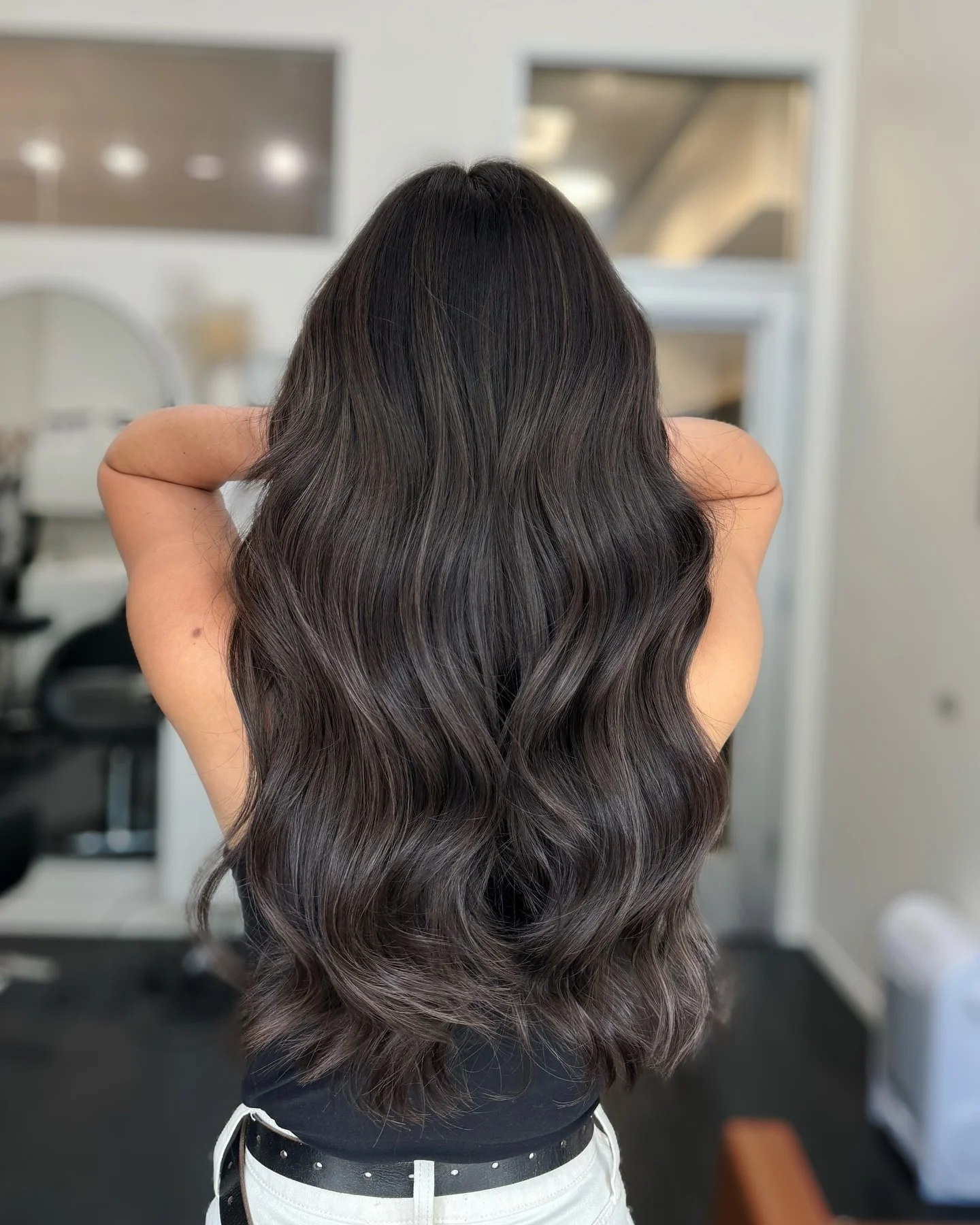 modern summer ash brown hair color 2026 Deep Cool Brunette With Glossy Ash Undertones