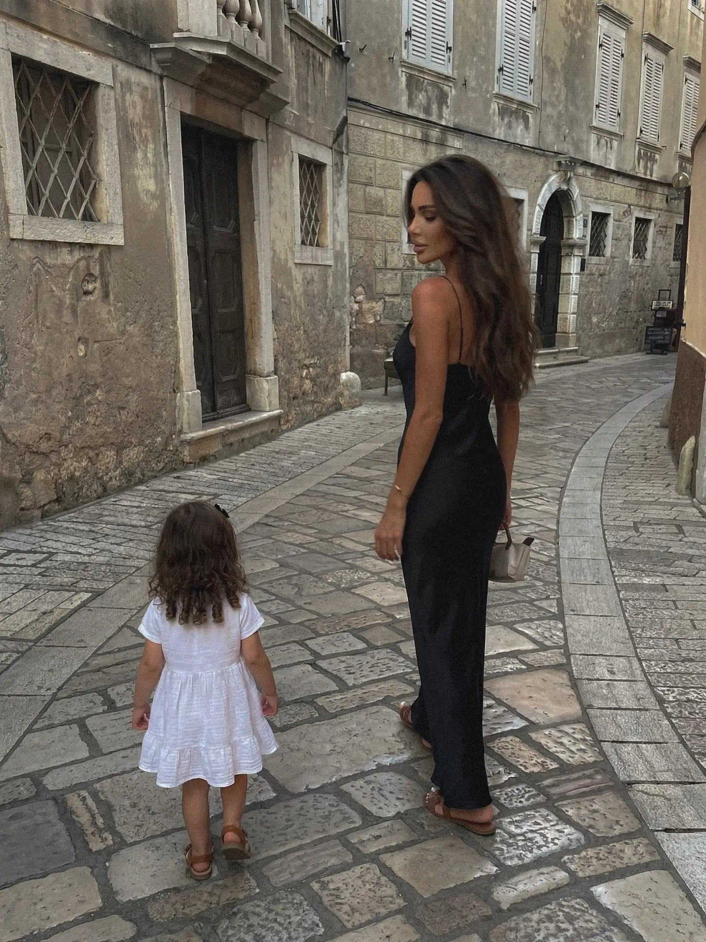 stylish mom outfits summer 2026 Minimal Black And Bare Summer Skin