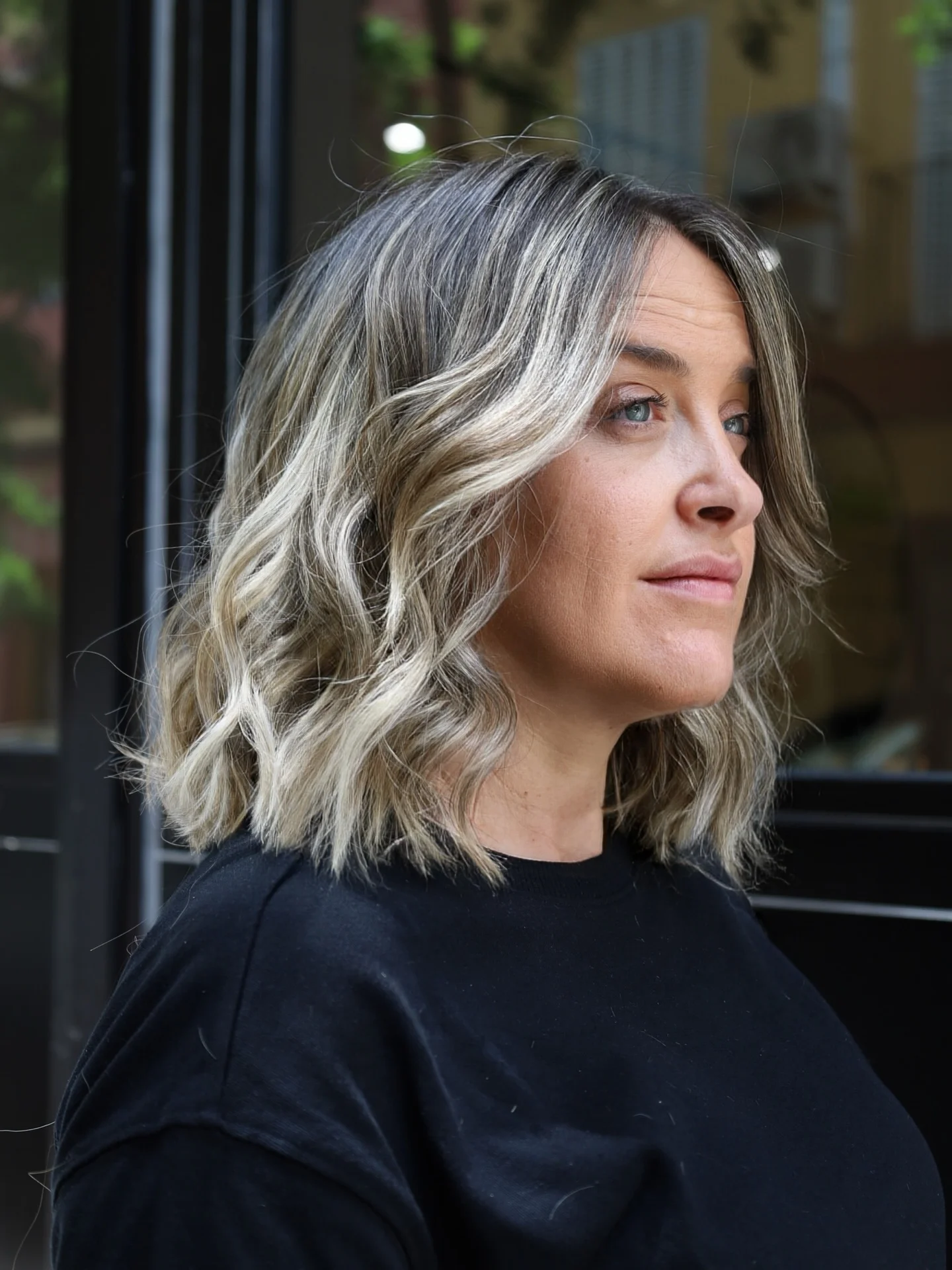 bright summer ash blonde hair color 2026 Chic Short Ash Blonde Waves With Modern Edge