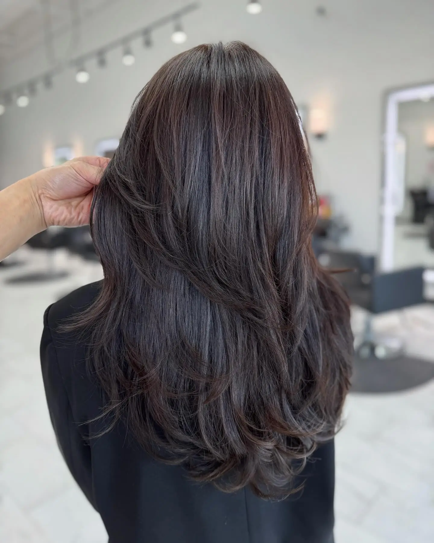 dark-rooted summer hair color for brunettes 2026 Layered Espresso Cut With Soft Movement
