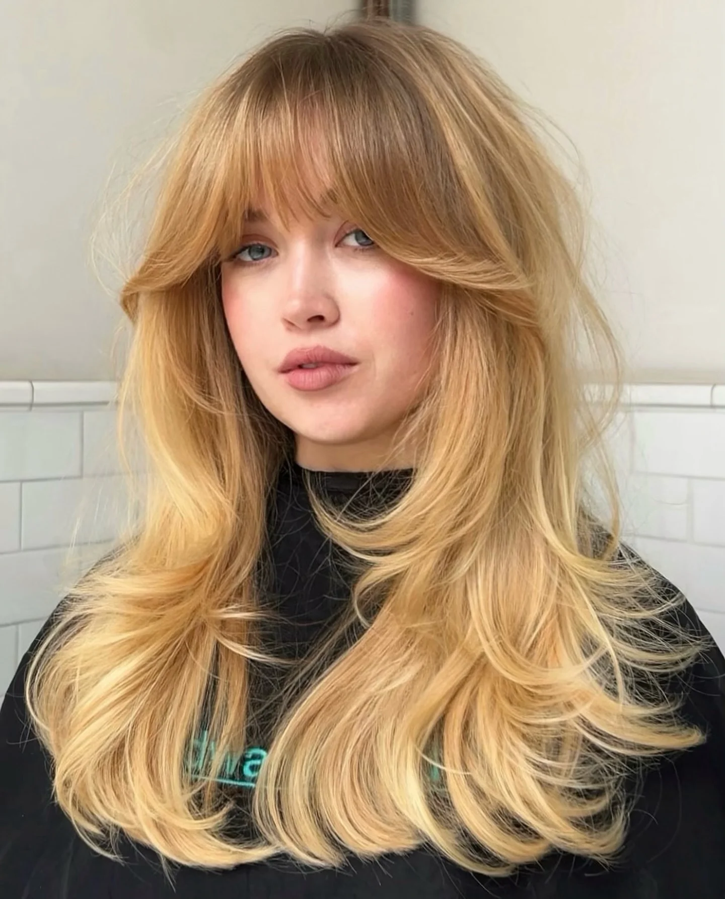 airy summer haircuts with bangs 2026 Voluminous Long Layers With Soft Curtain Bangs