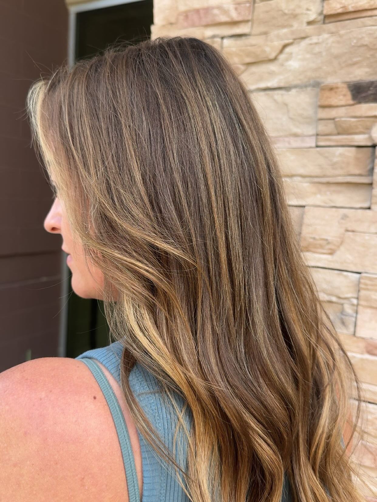 light summer hair color brunette Sunlit Brunette With Face-Framing Blonde Ribbons