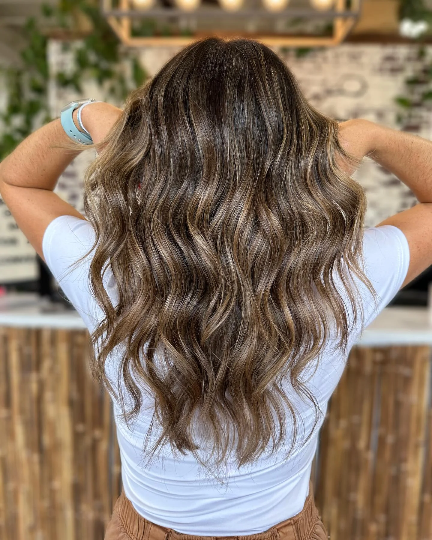 beachy summer hair color for tan skin 2026 Neutral Beige Waves With Dimensional Brunette Depth