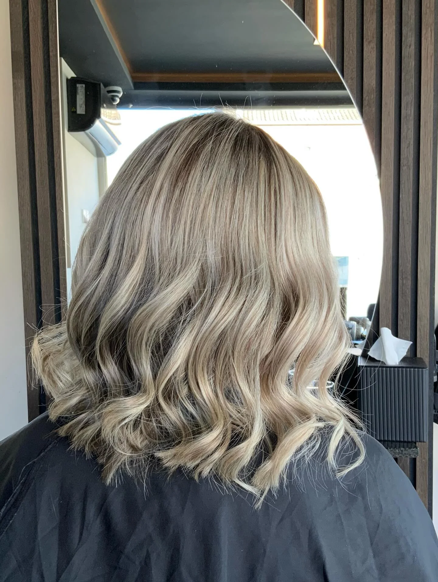 bright summer ash blonde hair color 2026 Soft Wavy Lob With Cool Blonde Depth