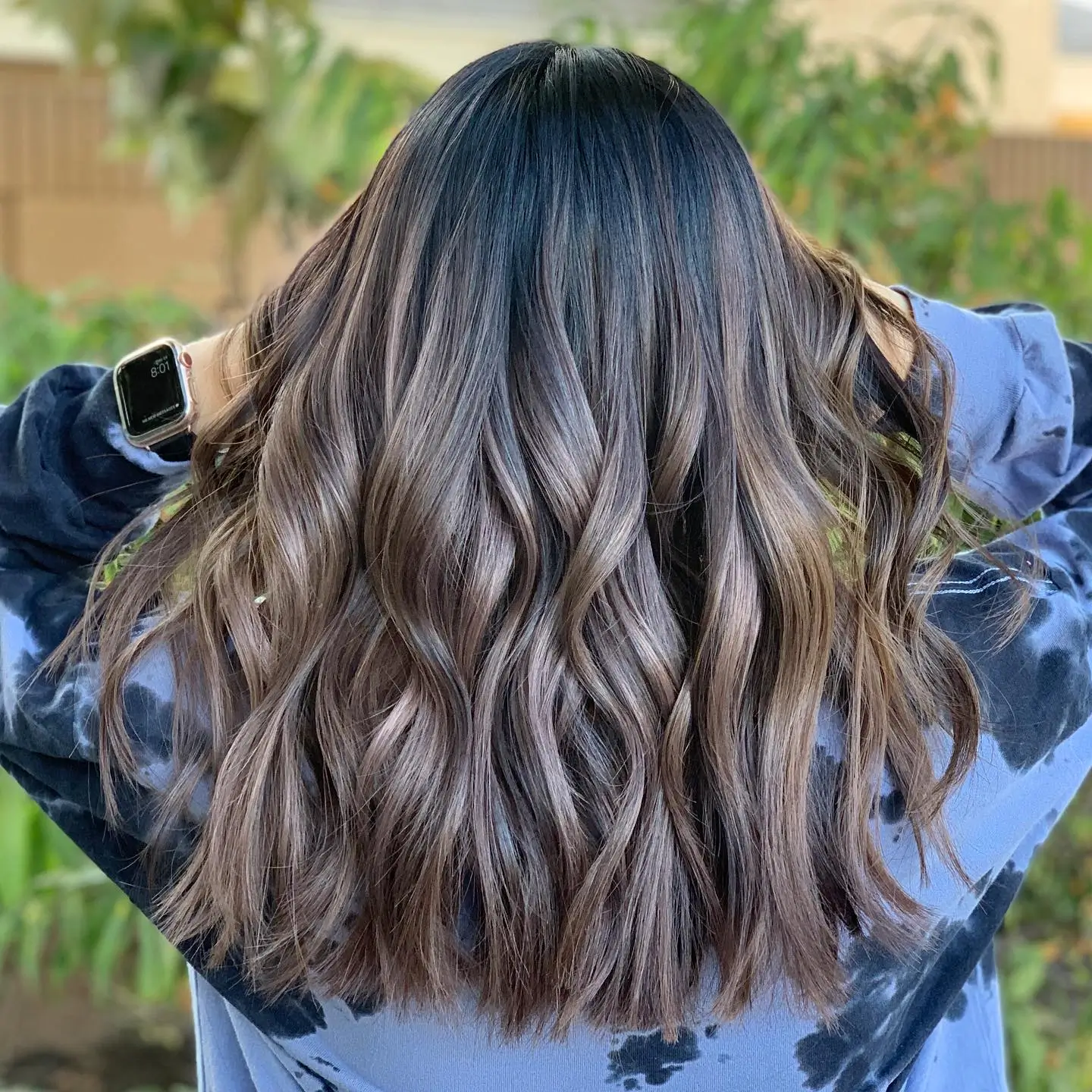 smoky summer mushroom brown hair color 2026 Cool-Toned Mushroom Brown With Glossy Defined Waves