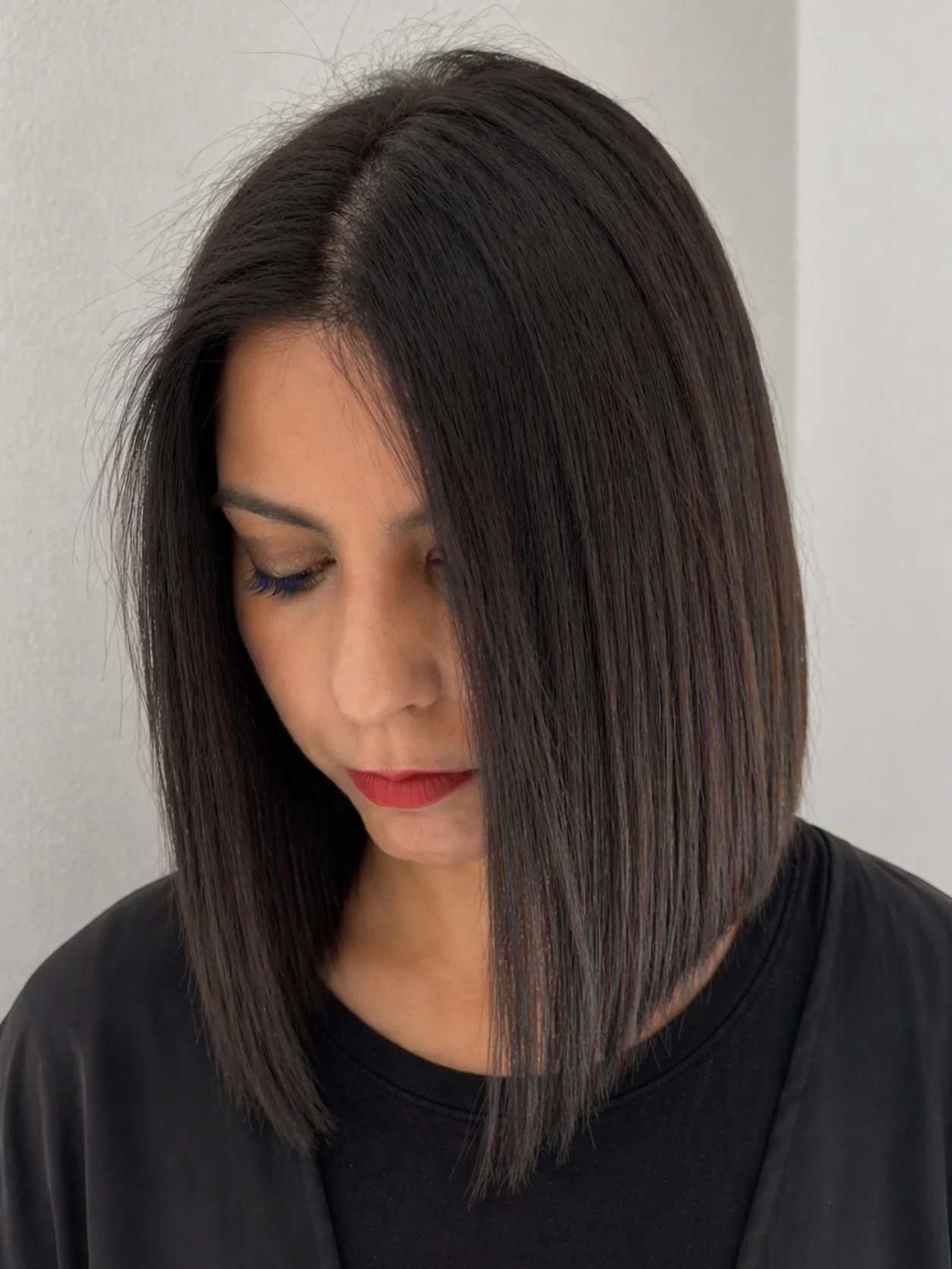angled summer bob haircut 2026 Sleek Precision With A Soft Summer Edge