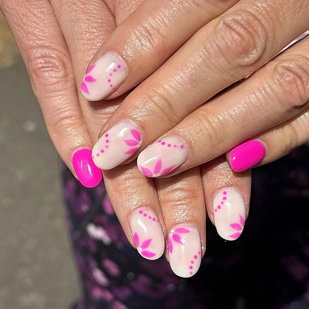 pink summer nails 2026 Milky Petal Nails With Bright Pink Accents