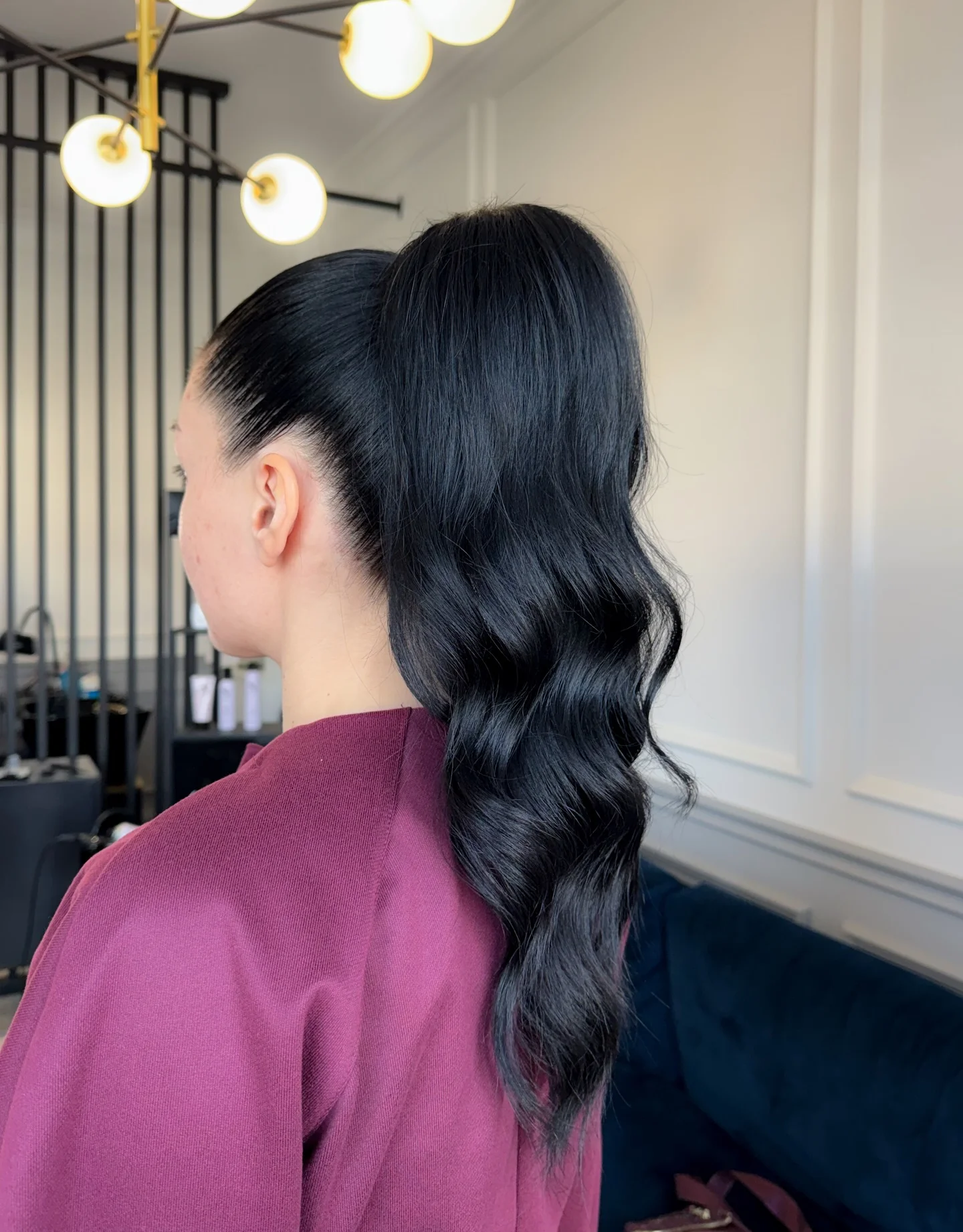 polished summer ponytail hairstyle 2026 Glossy Midnight Waves With A High Ponytail Finish