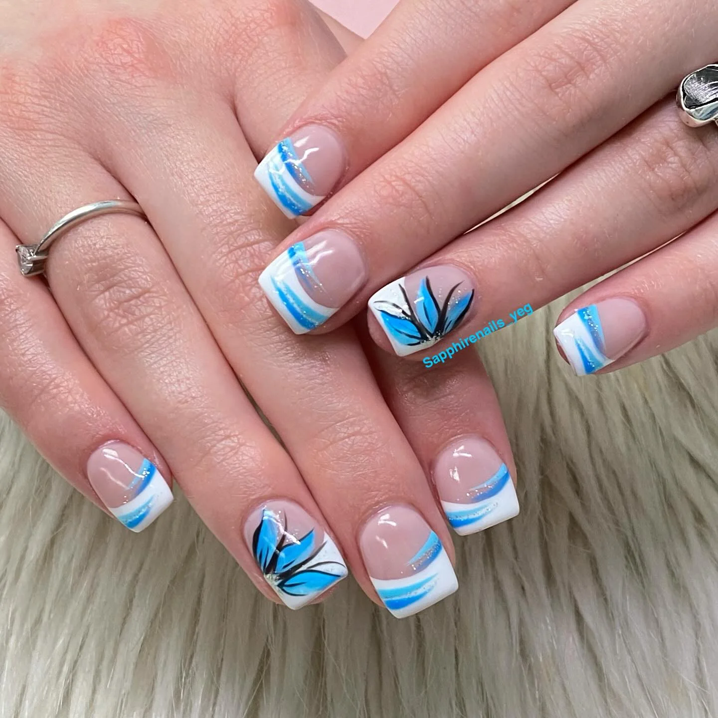 short summer nails 2026 Ocean Breeze French Tips With Blue Botanical Details