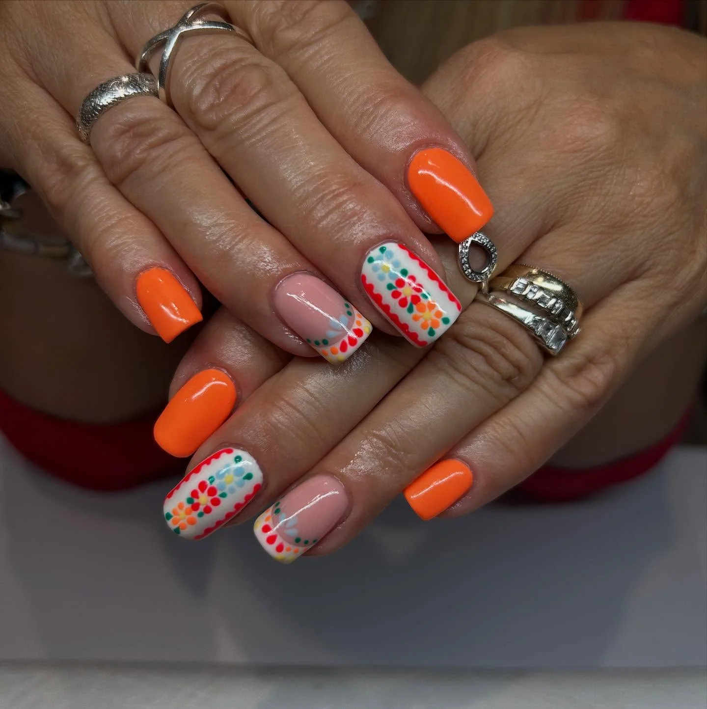 summer nail art 2026 Neon Folk Florals With Juicy Orange Energy