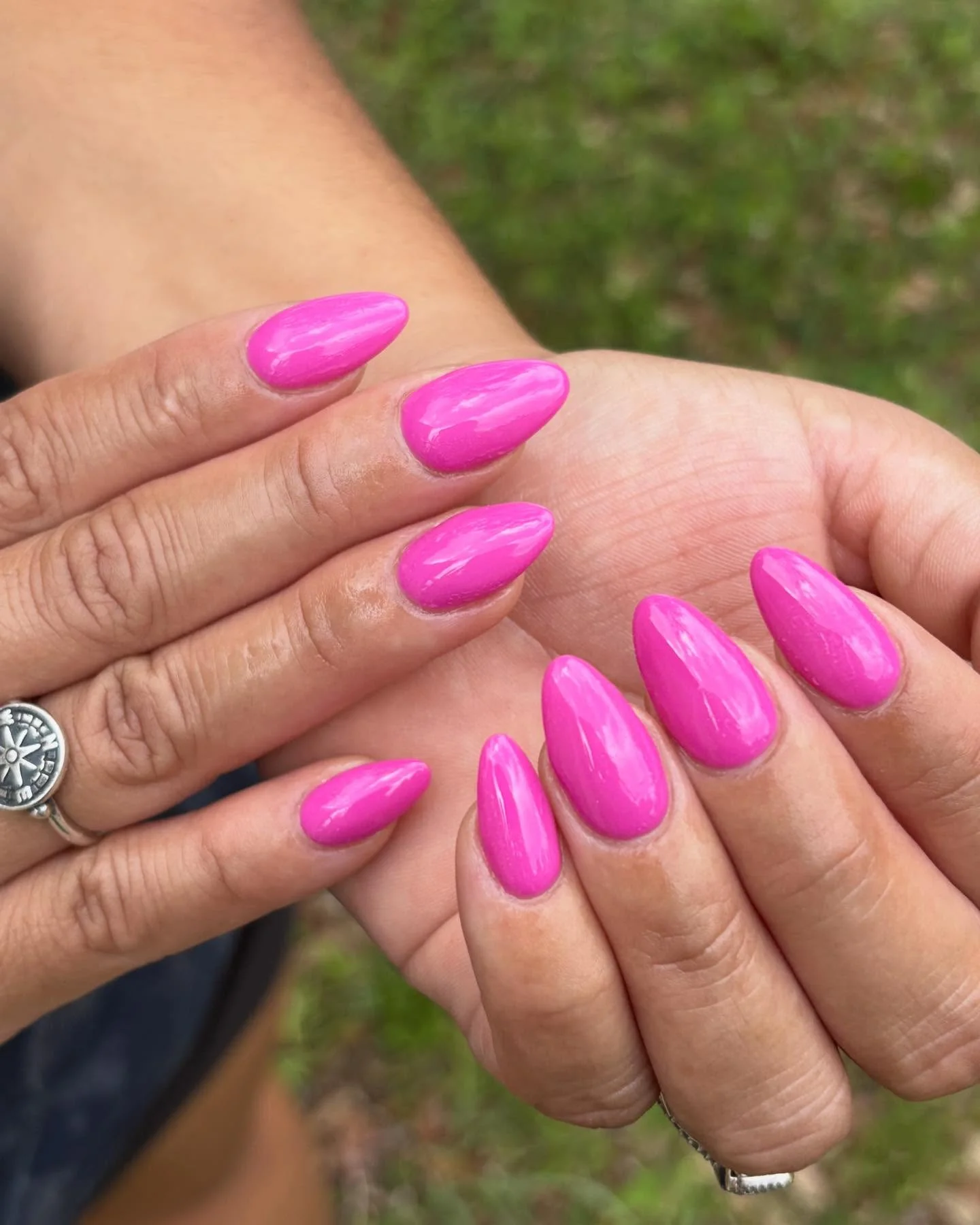 summer nail colors 2026 Glossy Electric Pink Almond Nails