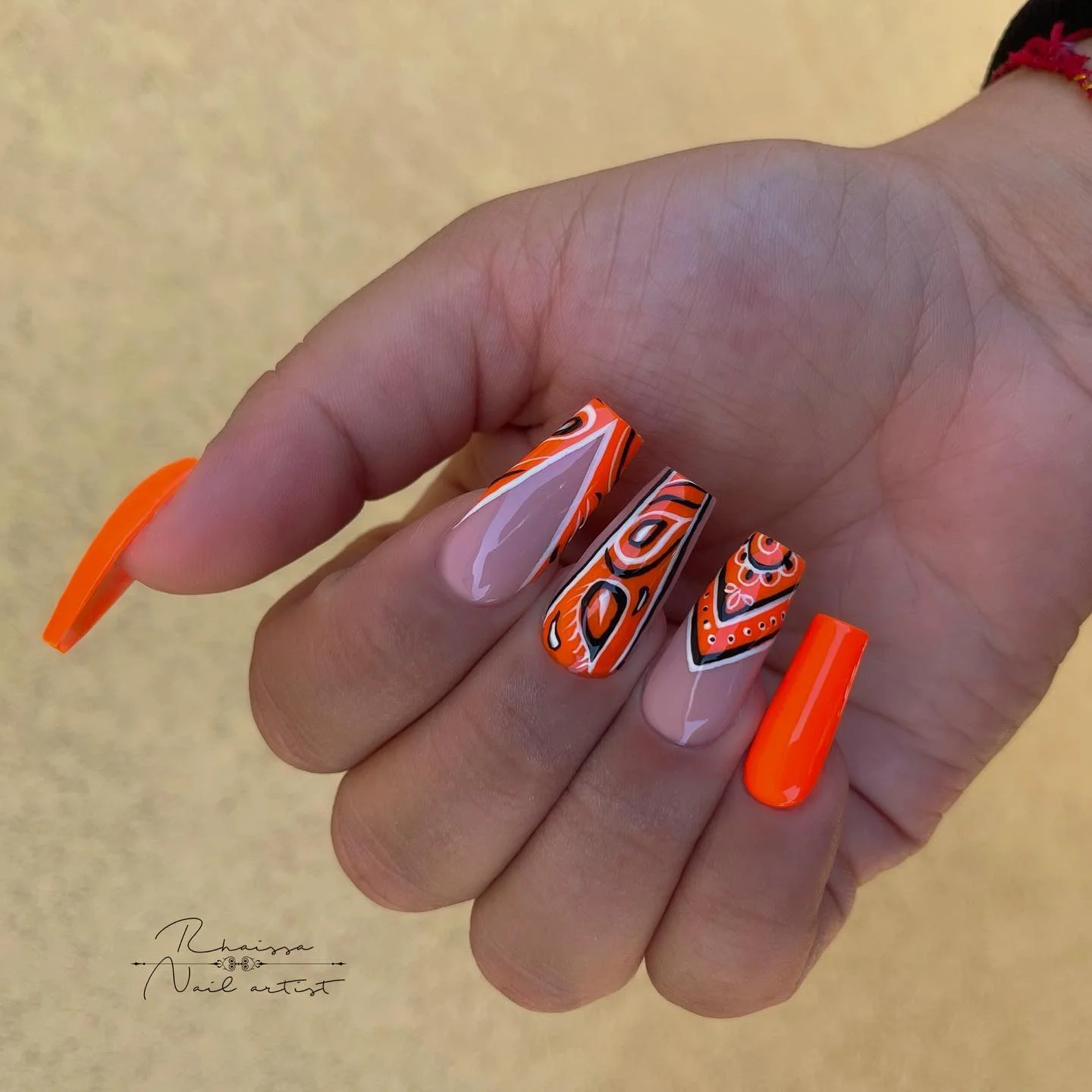summer nails ballerina shape 2026 Neon Orange Bandana Ballerina Nails With Graphic Summer Energy