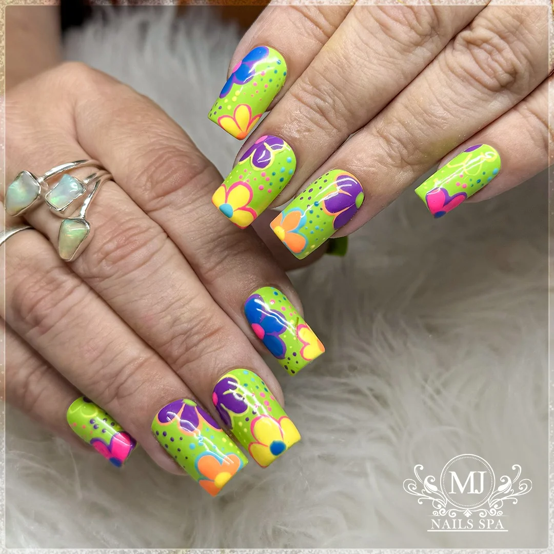 summer vibrant nails 2026 Neon Garden Party Nails With Retro Flower Energy